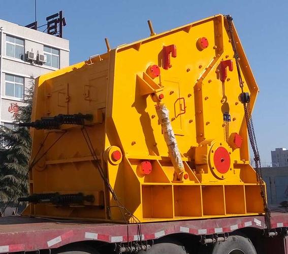 Impact crusher being loaded for shipment